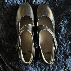 Beautiful black leather heeled shoes with Velcro strap